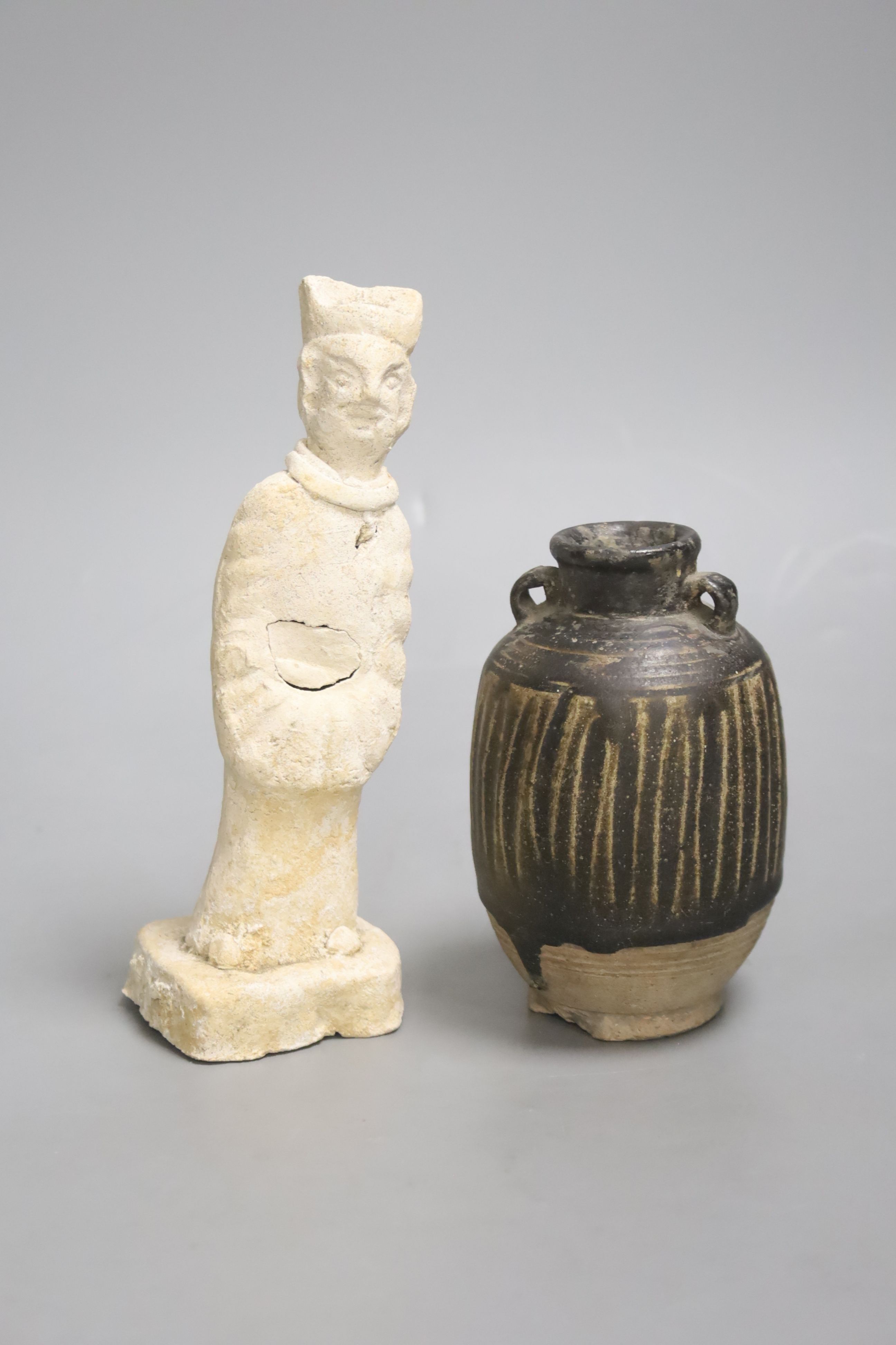 A Thai Sawankhalok jarlet and a Tang pottery figure, height 18cm